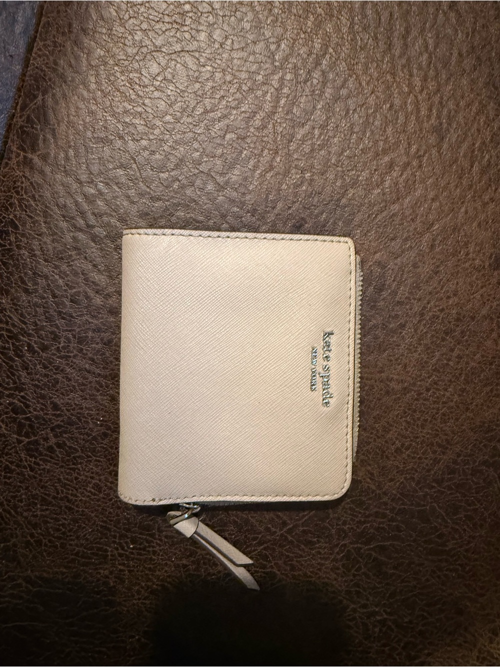 kate spade cream compact zip-around card holder wallet